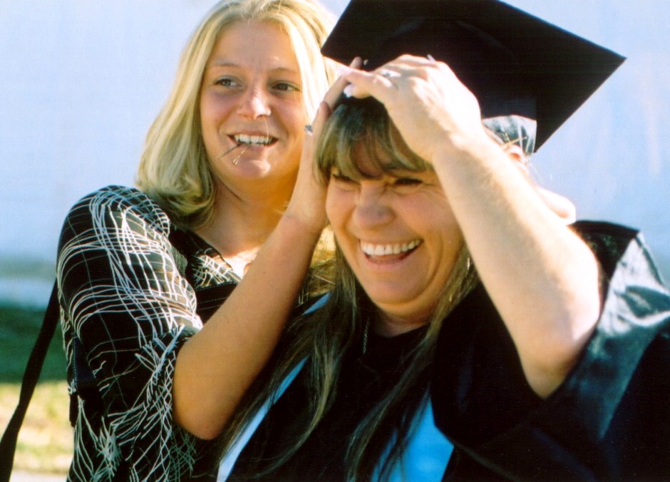 Rebekah helps
                    Cathy get ready