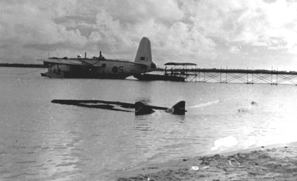 British Sunderland Flying Boat tied up at the
                    East Point Plantation Pier